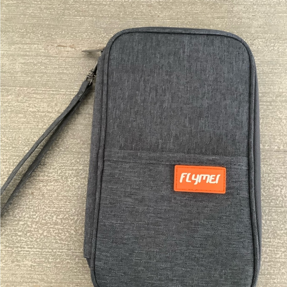NIP Flymei Dk grey travel wallet w zip, wrist strap and long strap.